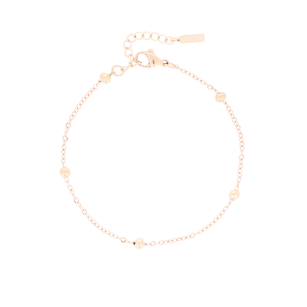 Rose coloured bracelet with dots