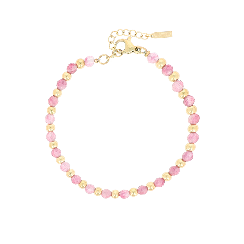 Gold bracelet with black natural stones