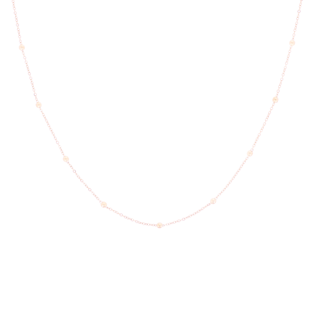Rose coloured necklace with dots